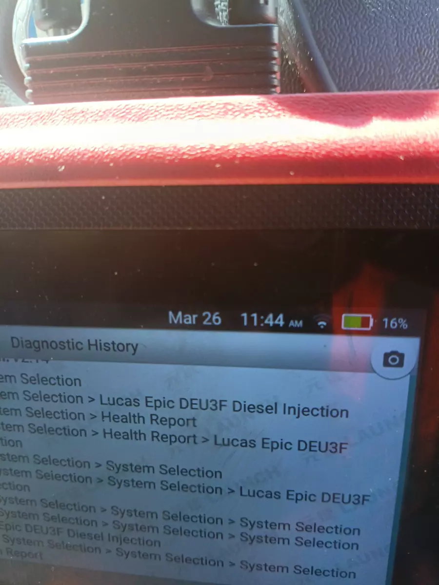 Automotive diagnostic scanner screen displaying diagnostic history menus